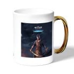 كوب قهوة بمقبض ذهبي بتصميم مقاتل ذا ويتشر 3 وايلد هانت