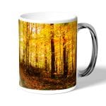 كوب قهوة بمقبض فضي بتصميم أوراق الخريف