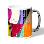 كوب قهوة بمقبض فضي بتصميم اشكال هندسيه