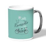 كوب قهوة بمقبض فضي بتصميم دراجه هوائيه