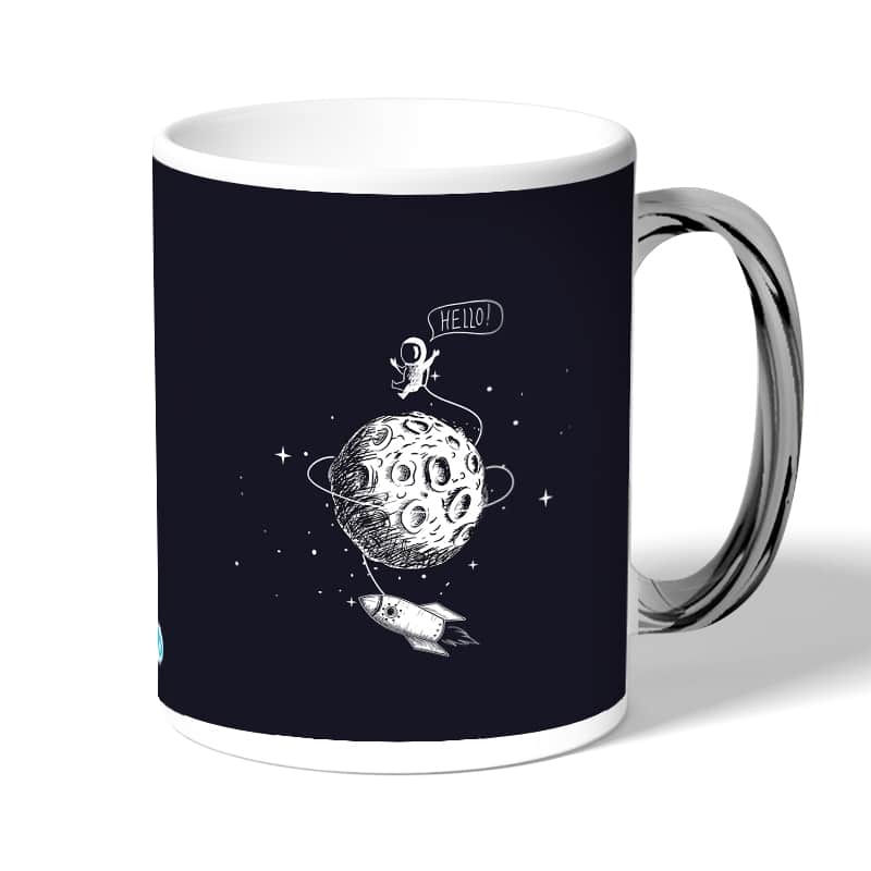 كوب قهوة بمقبض فضي بتصميم رائد فضاء كوب قهوة بمقبض فضي بتصميم رائد فضاء