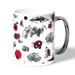 كوب قهوة بمقبض فضي بتصميم رسومات يابانيه