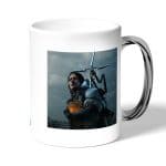 كوب قهوة بمقبض فضي بتصميم سام بريدجز ديث ستراندنغ