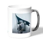 كوب قهوة بمقبض فضي بتصميم شياطين هومو ديث ستراندنغ