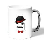 كوب قهوة بمقبض فضي بتصميم قبعة وشوارب