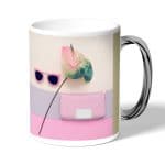 كوب قهوة بمقبض فضي بتصميم ورد مميز