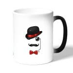 كوب قهوة سحري لون اسود بتصميم قبعة وشوارب