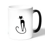 كوب قهوة سحري لون اسود بتصميم قطه انيقه