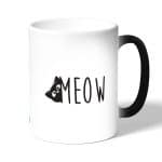 كوب قهوة سحري لون اسود بتصميم قطه لطيفه