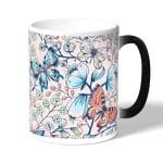 كوب قهوة سحري لون اسود بتصميم ورود وفراشات