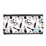 محفظة جلد  بتصميم ادوات المكياج والموضة