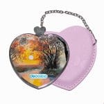 مرآة جيب جلد قلب بتصميم انعكاس الغروب