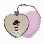 مرآة جيب جلد قلب بتصميم قبعة وشوارب