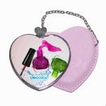 مرآة جيب جلد قلب بتصميم مناكير