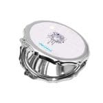 مرآة جيب صغيرة مزخرفة بتصميم بيت العصفور