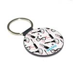 ميدالية مفاتيح دائرية بتصميم ادوات المكياج والموضة