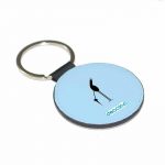 ميدالية مفاتيح دائرية بتصميم طائر أسود