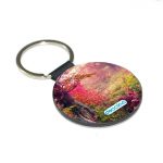 ميدالية مفاتيح دائرية بتصميم غابه ورود